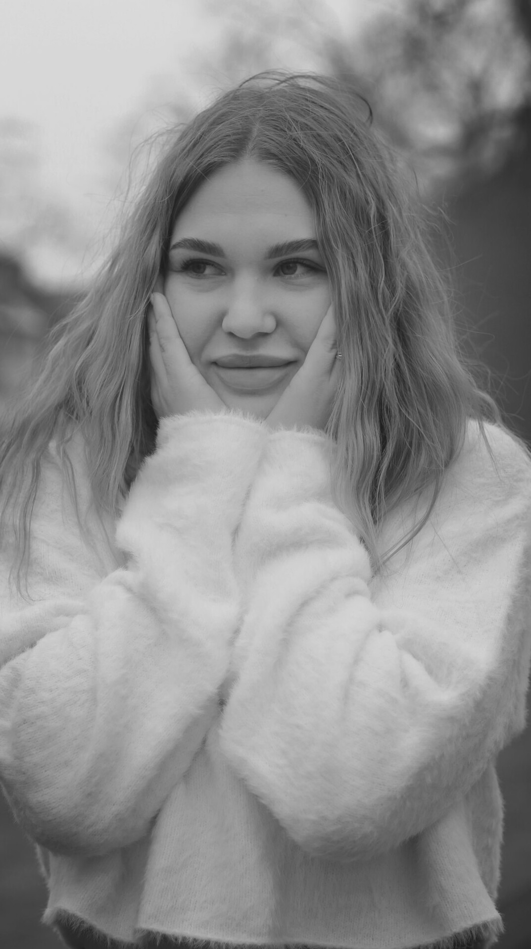 Portrait of a young woman with a warm smile